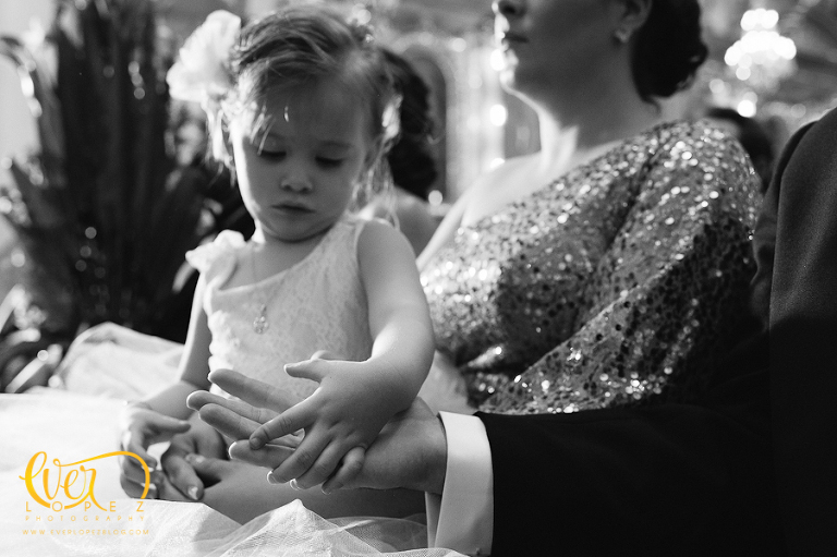 mexico wedding photographer ever lopez church kid bored during catholic ceremony little girl