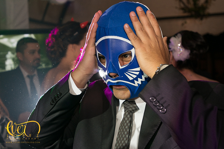 dancing guests wrestling masks mexico wedding photography www.everlopezblog.com mexican destination wedding photographer